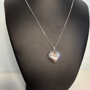 Preloved silver heart locket on a 18” sterling silver chain