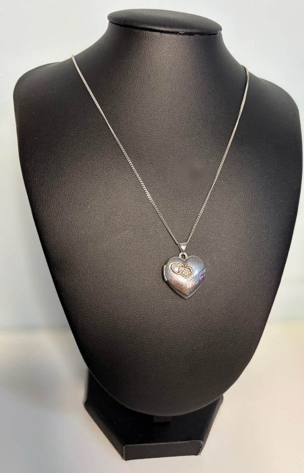 Preloved silver heart locket on a 18” sterling silver chain