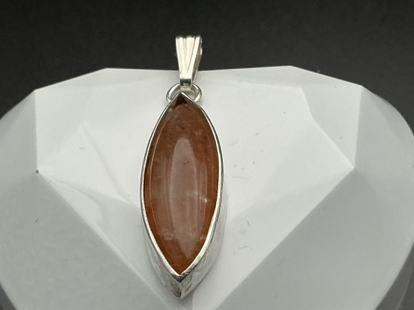 Amber pendant in sterling silver casing