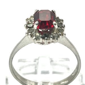 Silver ring with red and white stones