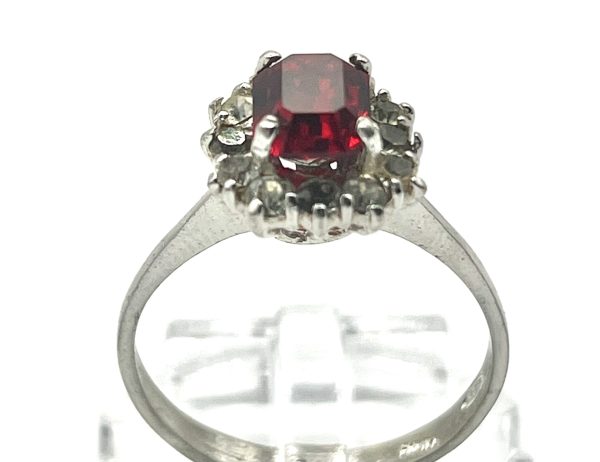 Silver ring with red and white stones