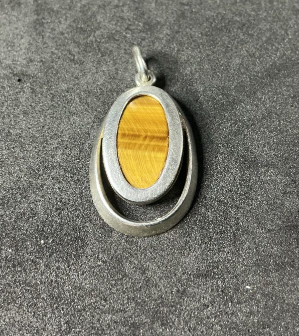 Tigers eye pendant with a silver setting