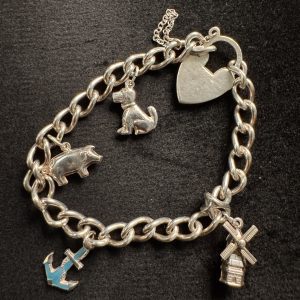 6” Sterling silver charm bracelet with 4 charms
