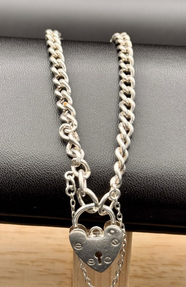 Stirling Silver charm bracelet with heart clasp