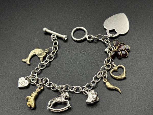 7” Charm bracelet with gold and silver charms - Image 5