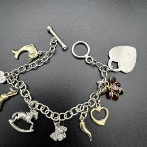 7” Charm bracelet with gold and silver charms