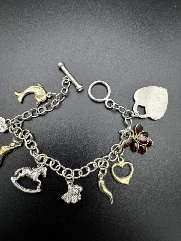 7” Charm bracelet with gold and silver charms