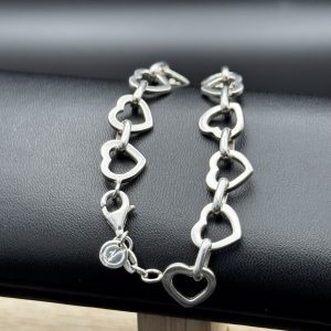 Sterling silver heart link bracelet.