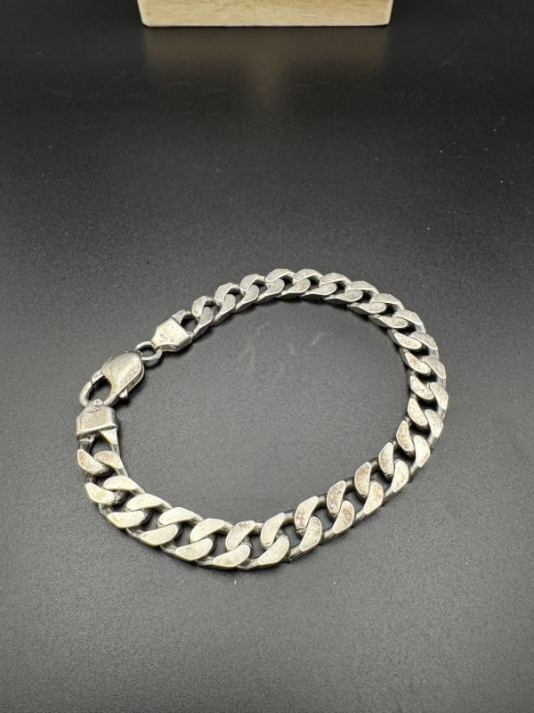 9” Solid Silver men’s curved bracelet.