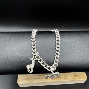 7” Sterling silver charm bracelet with horse and stag charm.