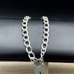 Sterling silver heavy charm bracelet with heart clasp