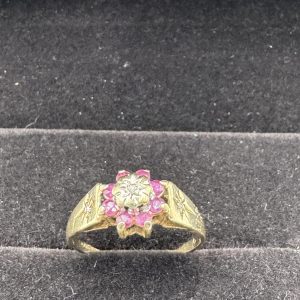 9 carat gold ruby and diamond clustering