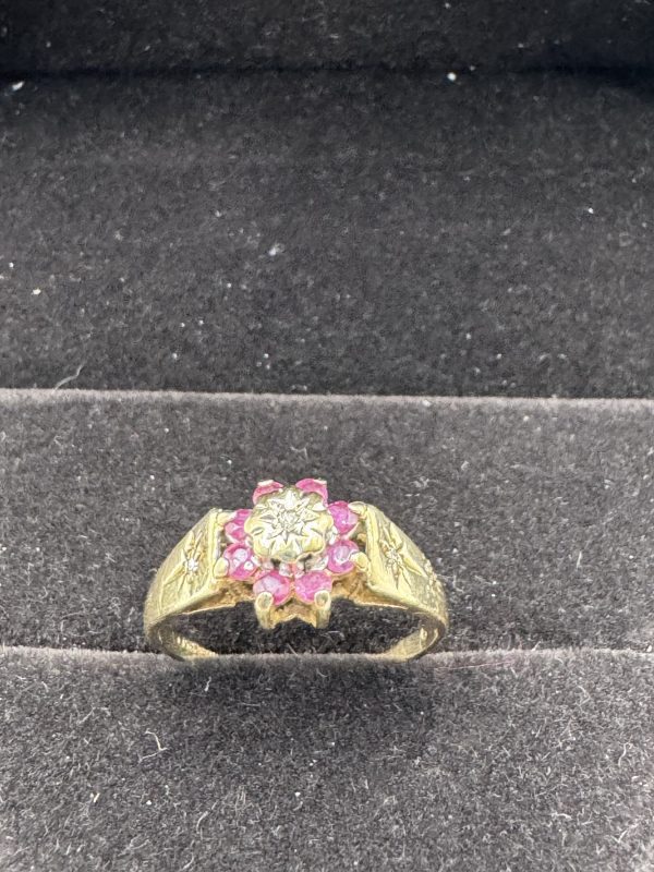 9 carat gold ruby and diamond clustering