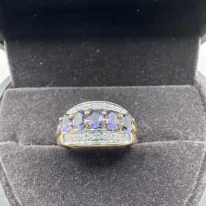 9 carat gold, amethyst and diamond clustering