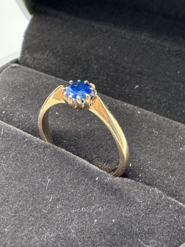 14 carat yellow gold ring with blue Tanzanite stone