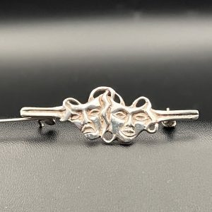 Vintage silver theatre mask brooch