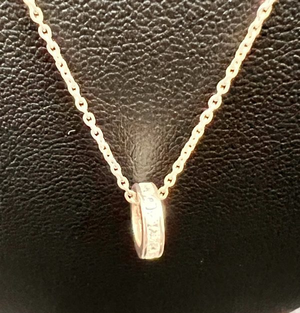 16” sterling silver necklace with round diamante wheel pendant