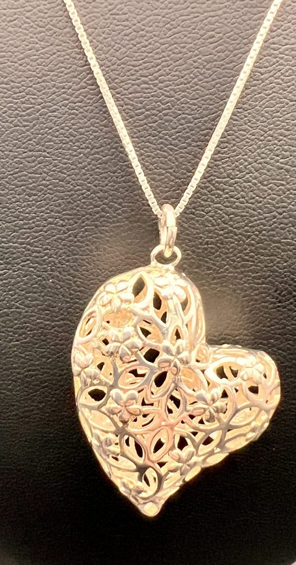16” fine Sterling chain featuring a large floral filigree heart pendant