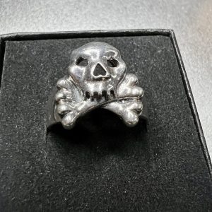 Sterling silver skull and cross bone ring