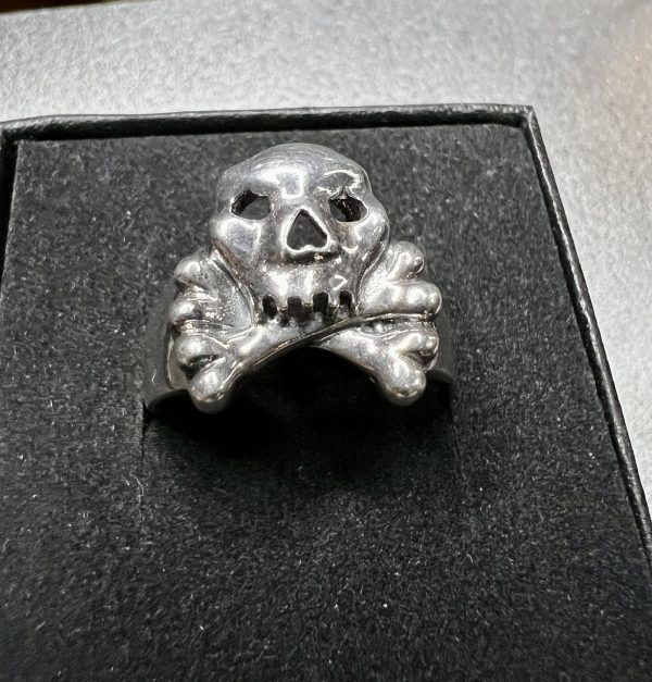 Sterling silver skull and cross bone ring