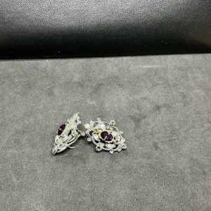 Art deco style clip on earrings with pink and white stone