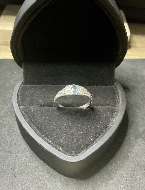 Sterling silver oval London blue topaz and CZ ring